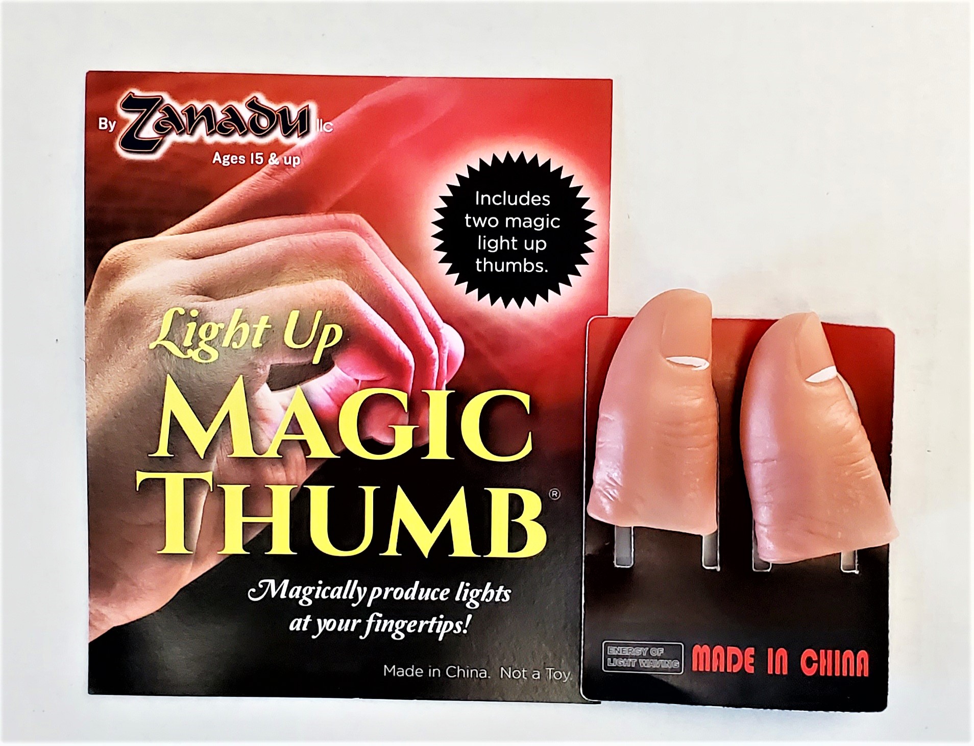 Light up Magic Thumb (Zanadu) - Pairs carded